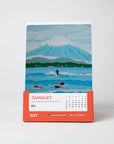 2027 art calendar featuring 12 colorful surf and ocean paintings by Alimo