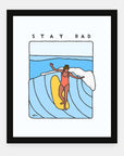 Stay Rad art print by Alimo in black frame, surf lifestyle scene