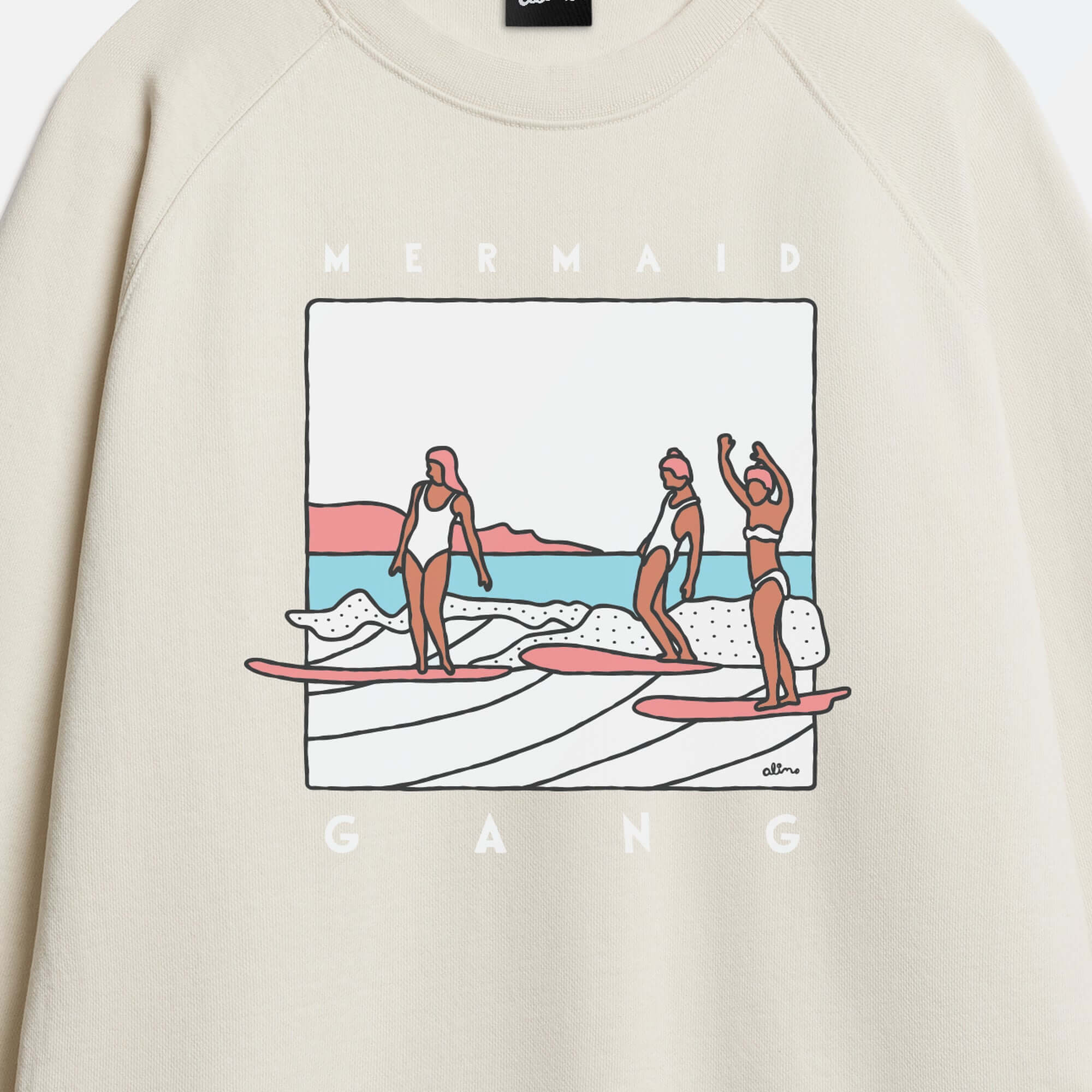 Surfers riding a wave on Mermaid Gang sweatshirt by Alimo