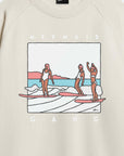 Surfers riding a wave on Mermaid Gang sweatshirt by Alimo